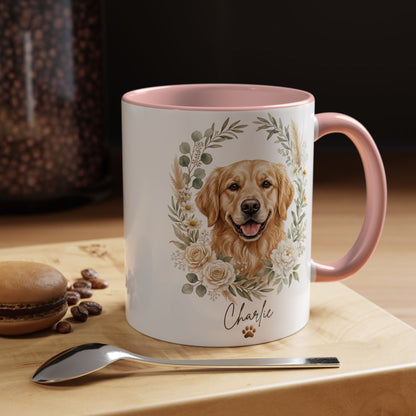 Mug with a dog illustration and floral design on a wooden surface with coffee beans and a macaron.