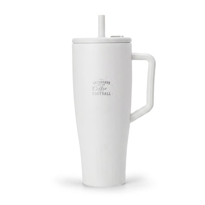 White mug with handle and straw on a white background